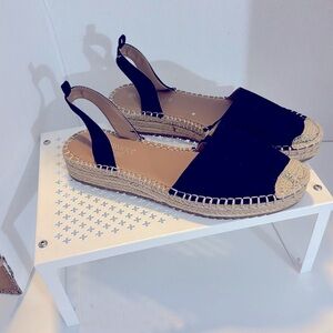 Dominique Nicole Black Espadrille Flats Size 10
Heels 1.5 Inches Wedge Heel